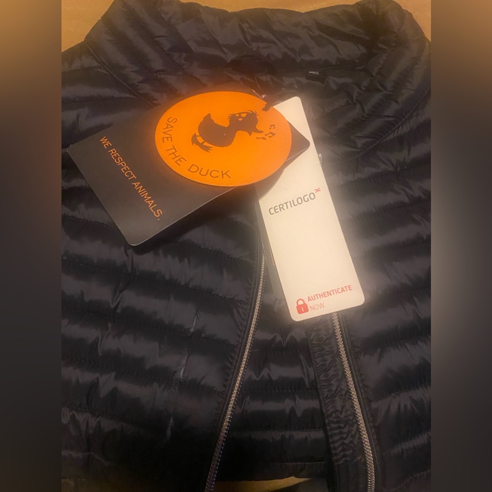 Women’s Size 4 or XL, Has a snag in front that’s fixable, Missing Bag